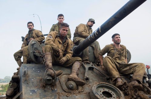 Brad Pitt (foreground) and tank crew (left to right): Shia LeBouf, ** , Michael Pena, I*.