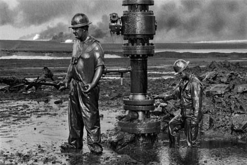 Workers extinguishing oil well fires in the wake of the first Gulf War